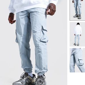 CRINKLE CARGO PANTS FACE PRINT